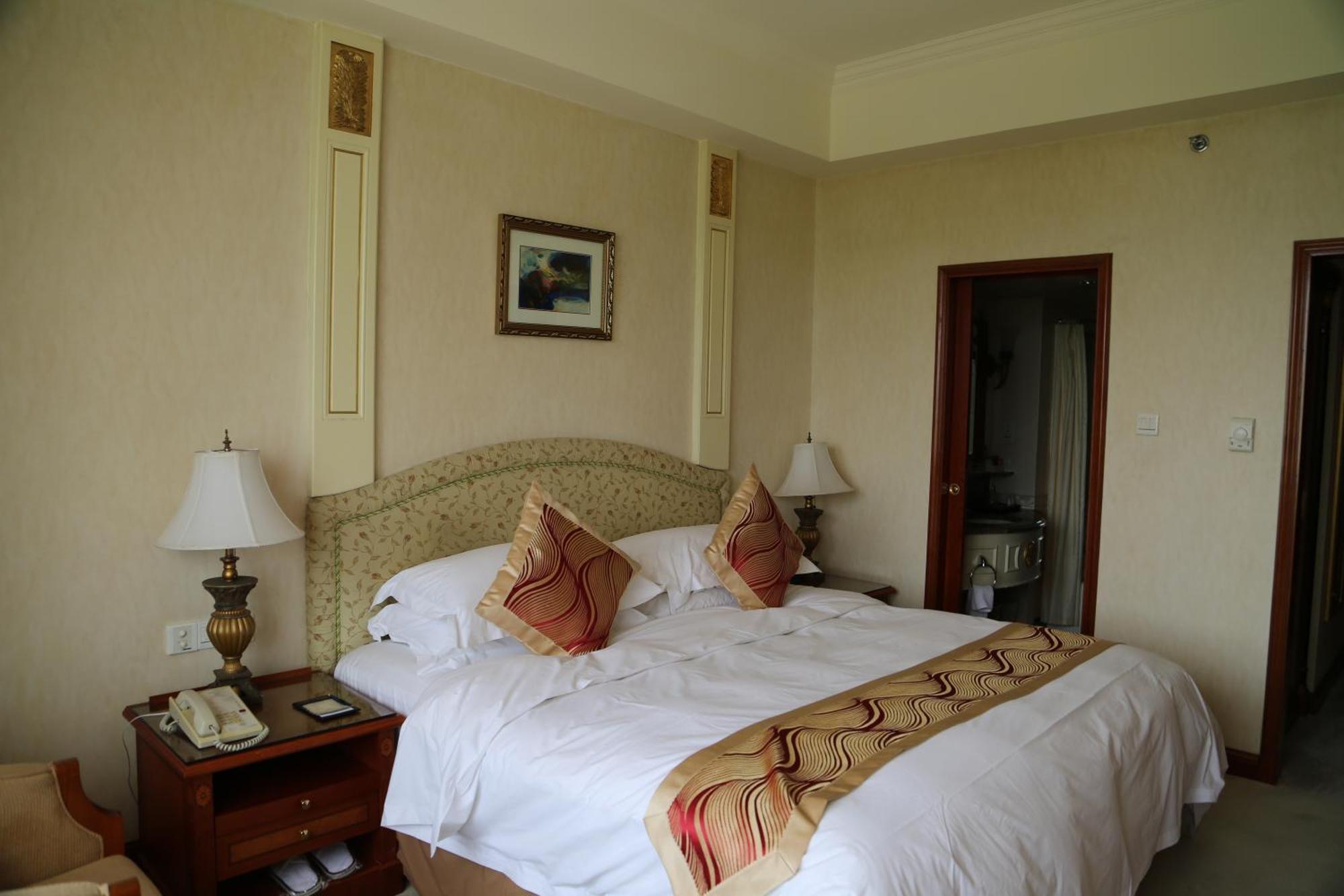 Huiquan Dynasty Hotel Thanh Đảo Phòng bức ảnh
